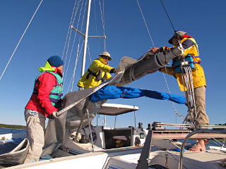 Rolling the jib onto boom for storage