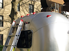 Specially-padded ladder for accessing Airstream roof