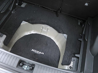 Rear floormat cut down to fit lower storage well