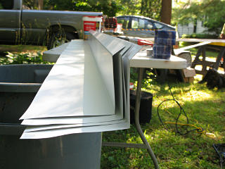 Pre-bent sill flashing pieces