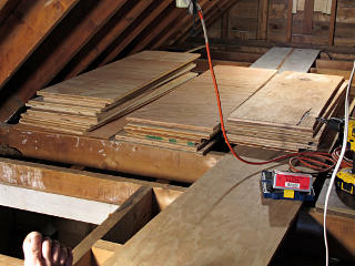 Plywood rips stacked in attic