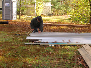 Last roofing panels getting cut